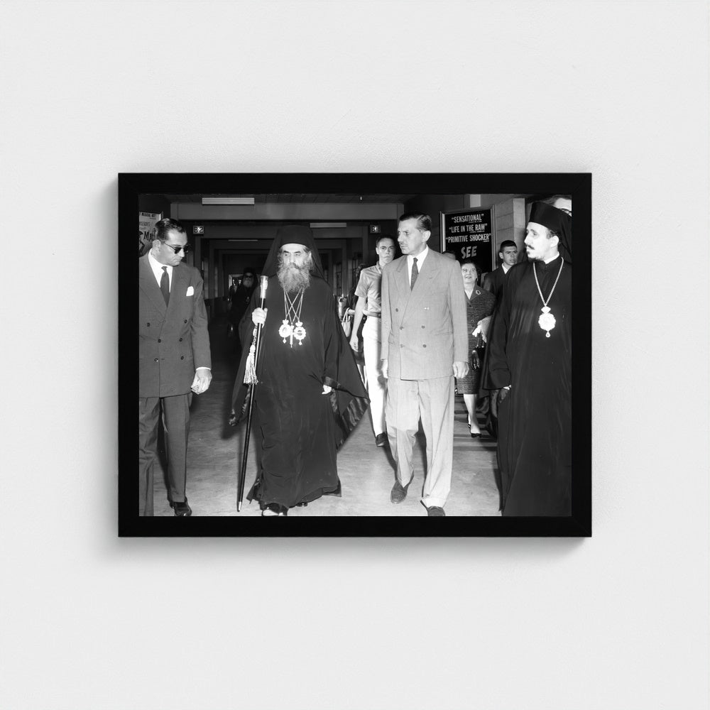 Community Leaders Outside a Storefront — 12 × 16 inch black framed print
