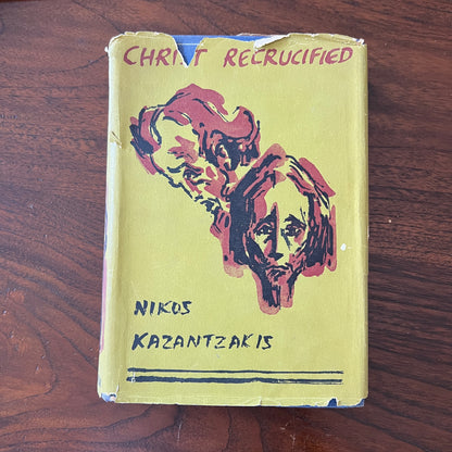 Worn yellow dust jacket of the 1954 first English edition of Christ Recrucified
