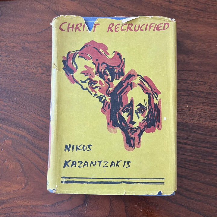 Worn yellow dust jacket of the 1954 first English edition of Christ Recrucified