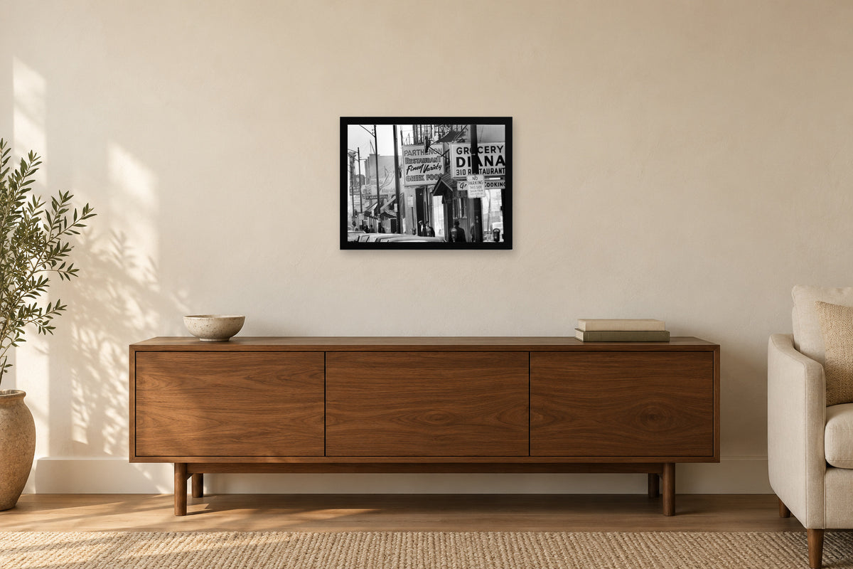The Neighborhood Street in a black frame, shown in a home setting — room visualization