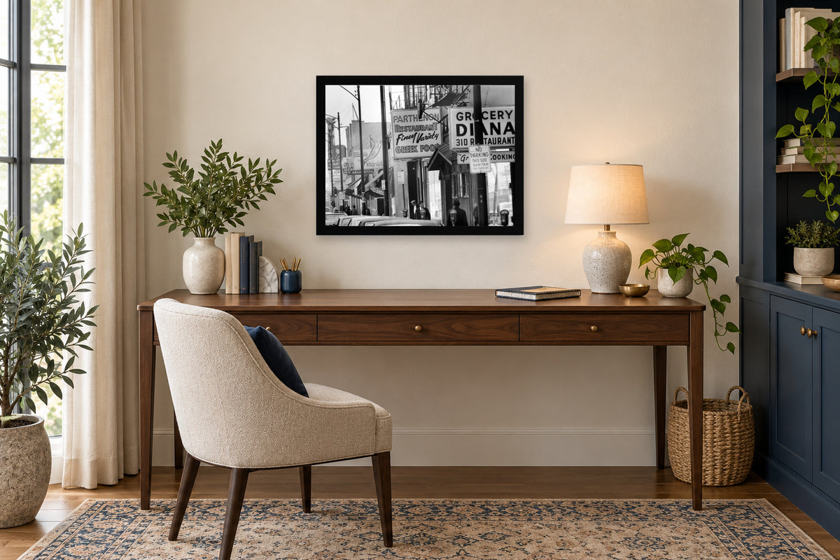 The Neighborhood Street in a black frame, shown in an office setting — room visualization