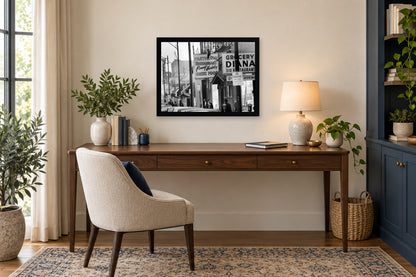 The Neighborhood Street in a black frame, shown in an office setting — room visualization