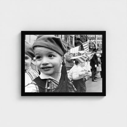 A Young Parade Participant — 12 × 16 inch black framed print