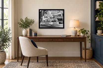 Greek Culture on the Marquee in a black frame, shown in an office setting — room visualization