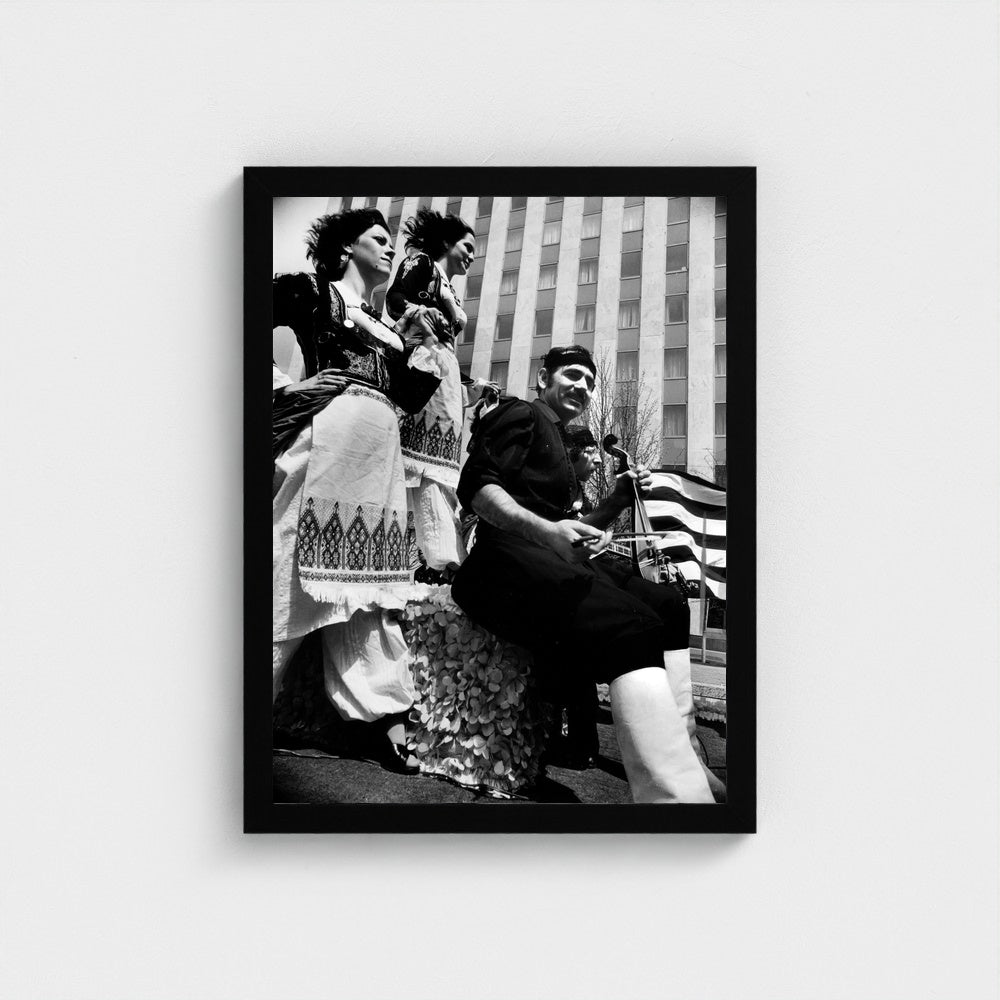 Musicians on a Parade Float — 12 × 16 inch black framed print