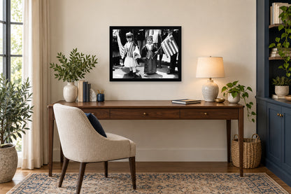 Children Carrying Flags in a black frame, shown in an office setting — room visualization