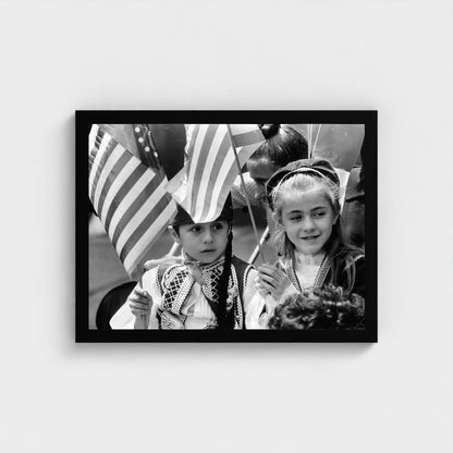 Young Girls at the Parade — 12 × 16 inch black framed print