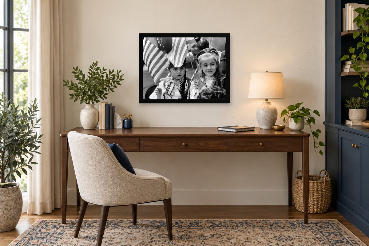 Young Girls at the Parade in a black frame, shown in an office setting — room visualization