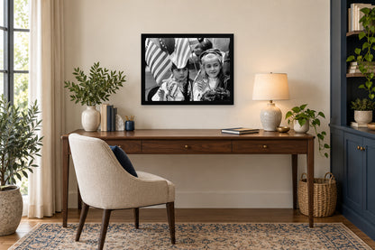 Young Girls at the Parade in a black frame, shown in an office setting — room visualization