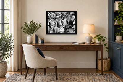 Children in Traditional Dress in a black frame, shown in an office setting — room visualization