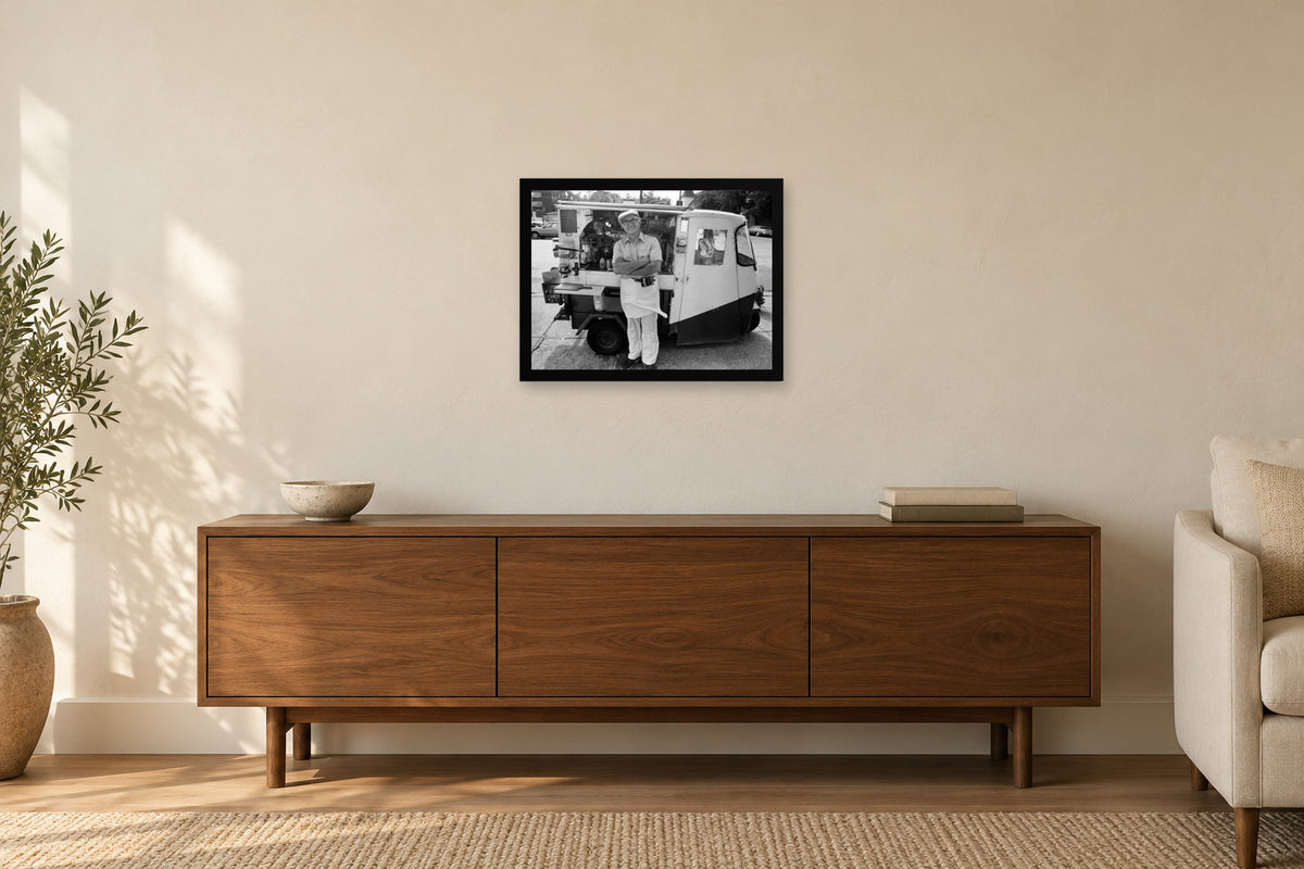 A Neighborhood Food Cart in a black frame, shown in a home setting — room visualization