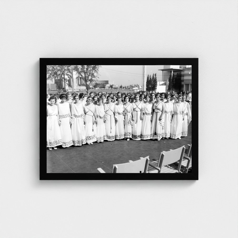Women in Matching Greek Dress — 12 × 16 inch black framed print