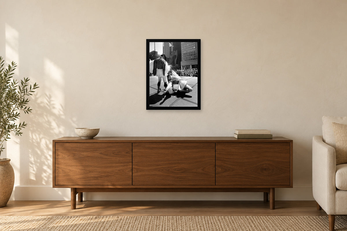 Dancers Performing in the Plaza in a black frame, shown in a home setting — room visualization