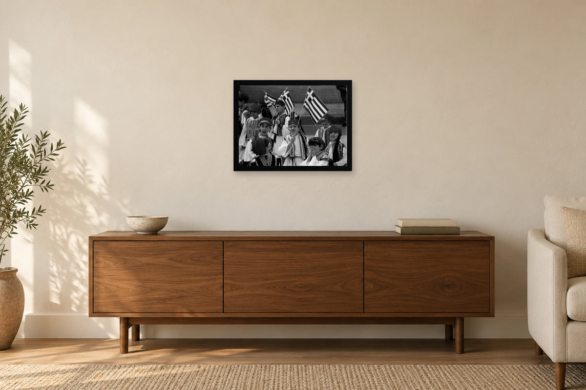 A Colorful Parade Group in a black frame, shown in a home setting — room visualization