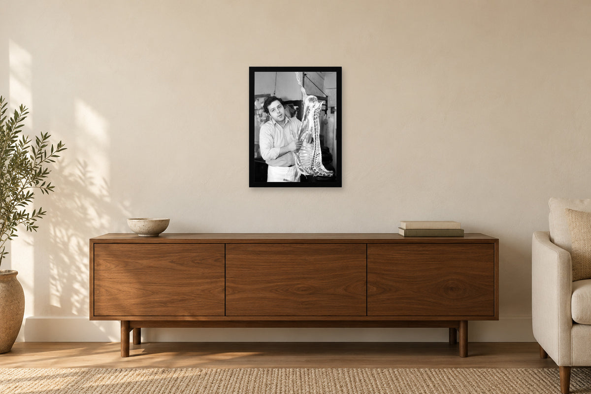 At the Butcher’s Counter in a black frame, shown in a home setting — room visualization