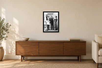 A Community Ceremony in a black frame, shown in a home setting — room visualization
