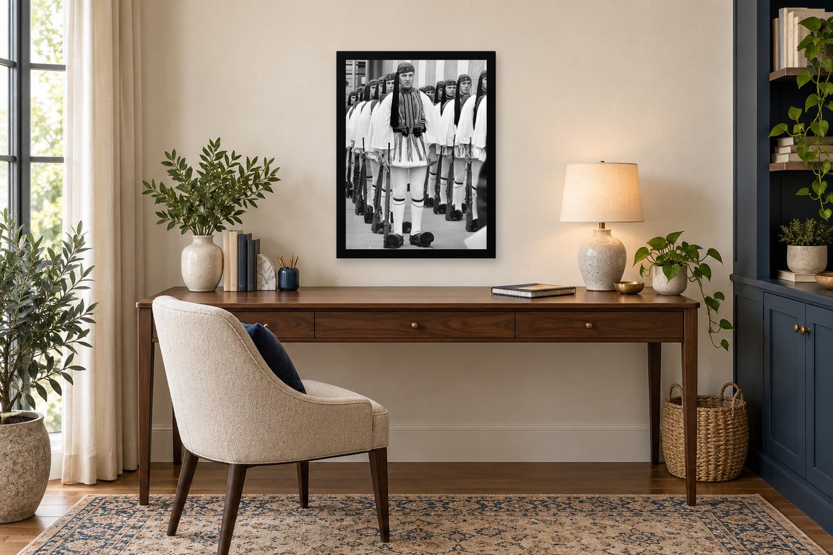 Evzones Standing Together in a black frame, shown in an office setting — room visualization