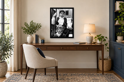 Generations at the Parade in a black frame, shown in an office setting — room visualization