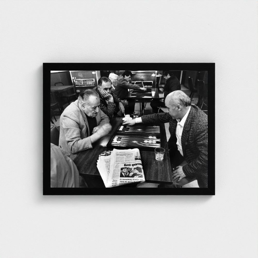 A Game at the Coffeehouse — 12 × 16 inch black framed print