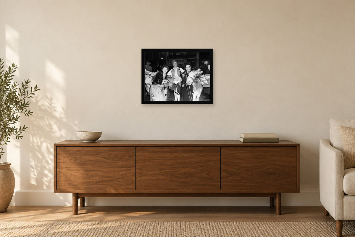 Flowers at a Community Celebration in a black frame, shown in a home setting — room visualization