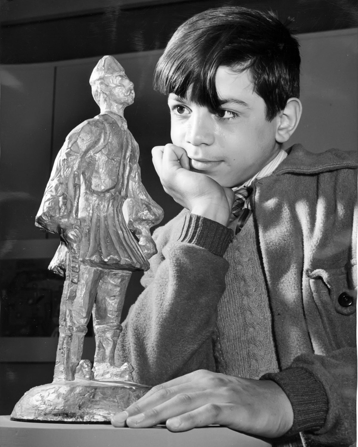 A Child with an Evzone Statuette — 8 × 10 inch art print