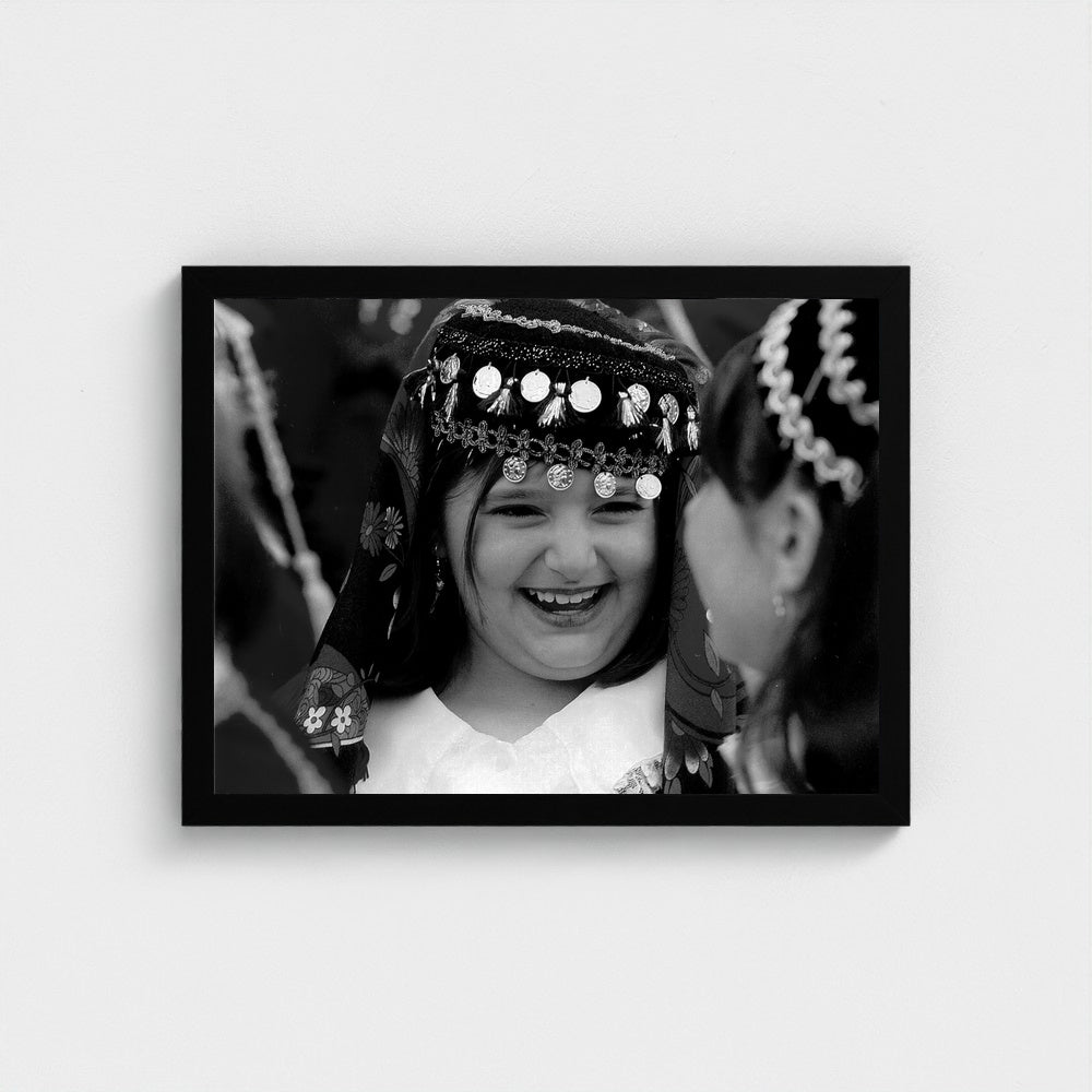 A Young Parade Participant — 12 × 16 inch black framed print