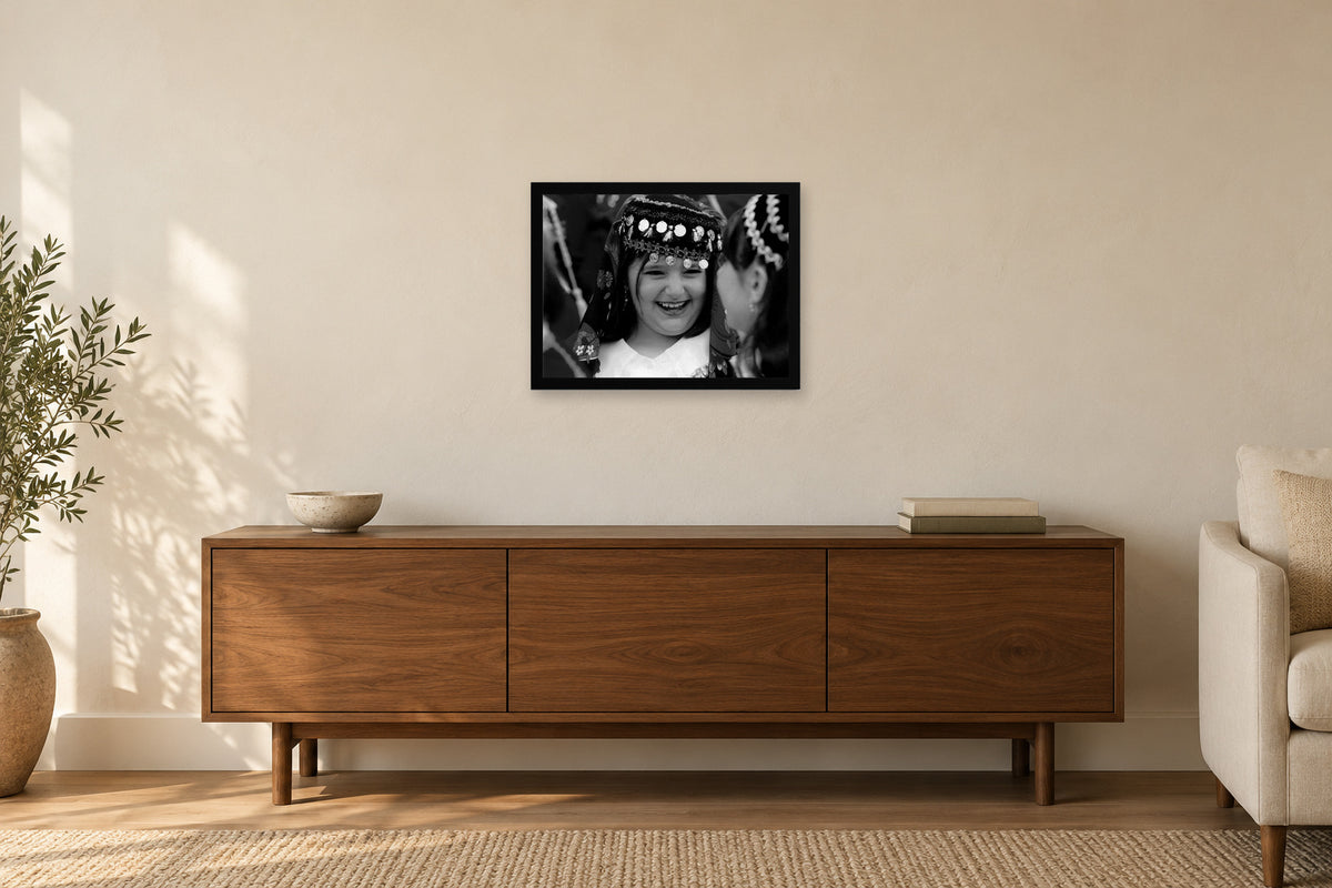 A Young Parade Participant in a black frame, shown in a home setting — room visualization