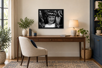 A Young Parade Participant in a black frame, shown in an office setting — room visualization