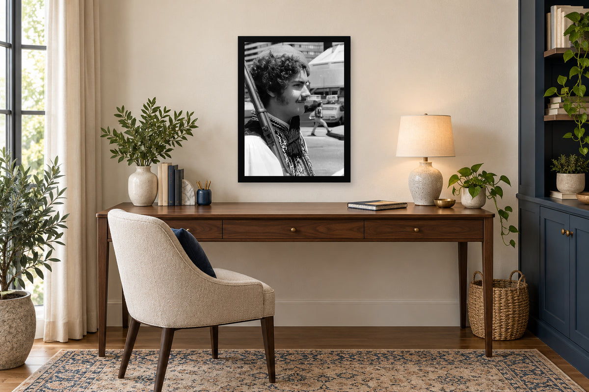 A Young Evzone at the Parade in a black frame, shown in an office setting — room visualization