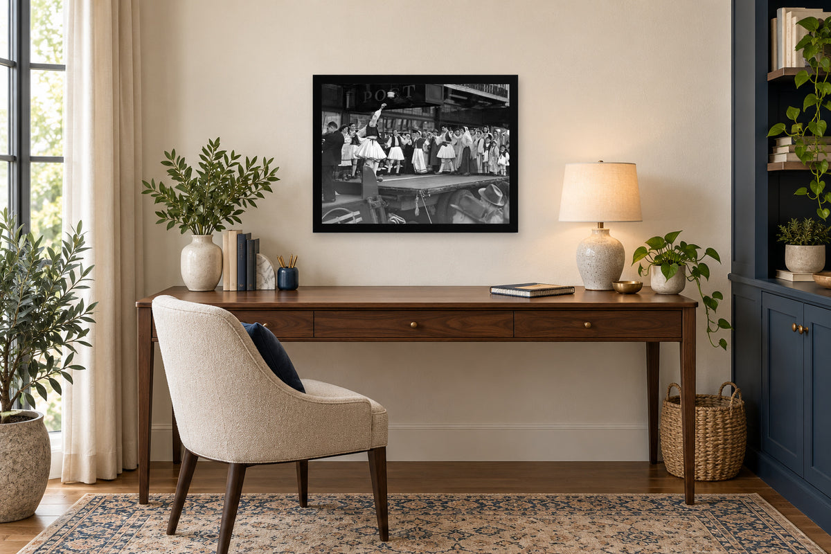 Dancers on a Street-stage Float in a black frame, shown in an office setting — room visualization