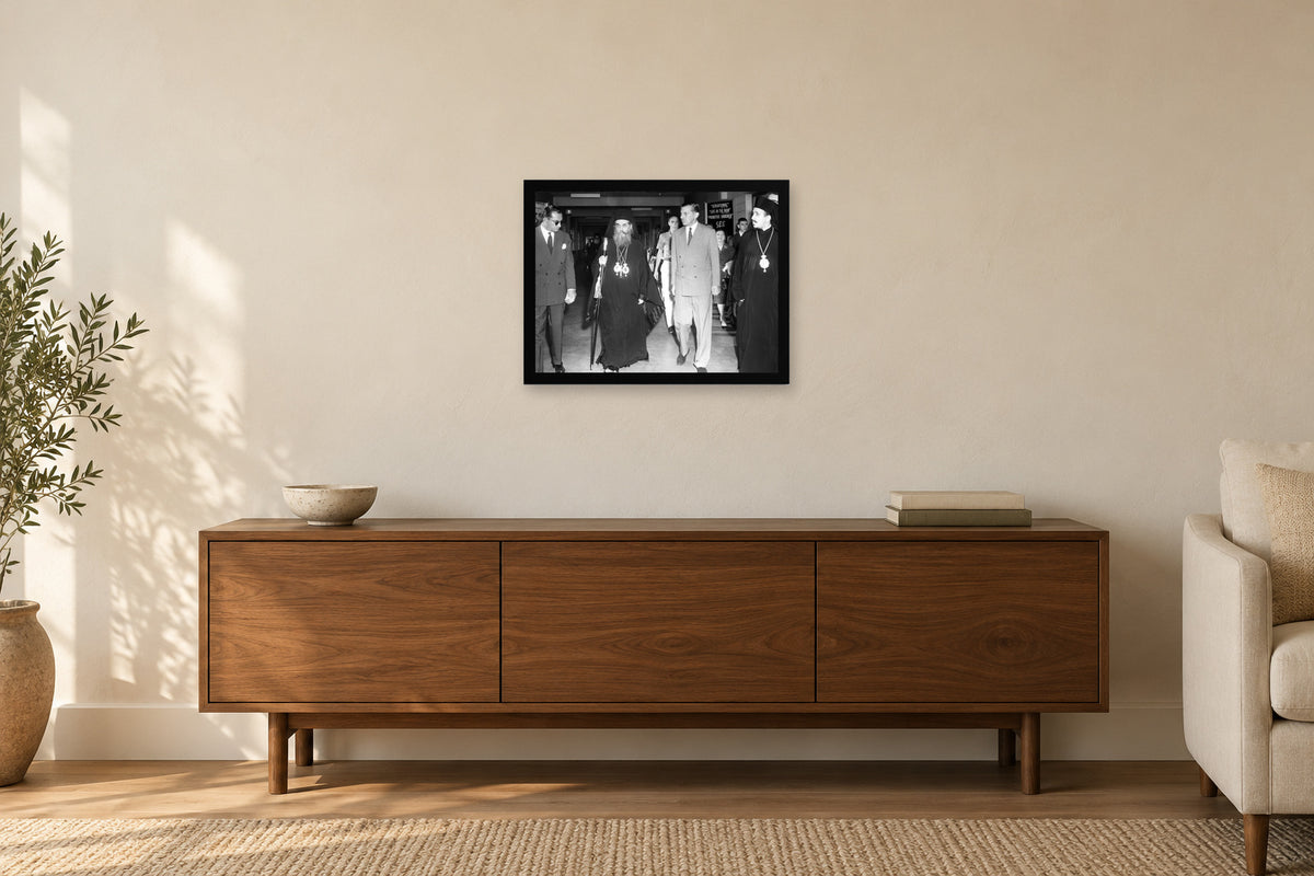 Community Leaders Outside a Storefront in a black frame, shown in a home setting — room visualization