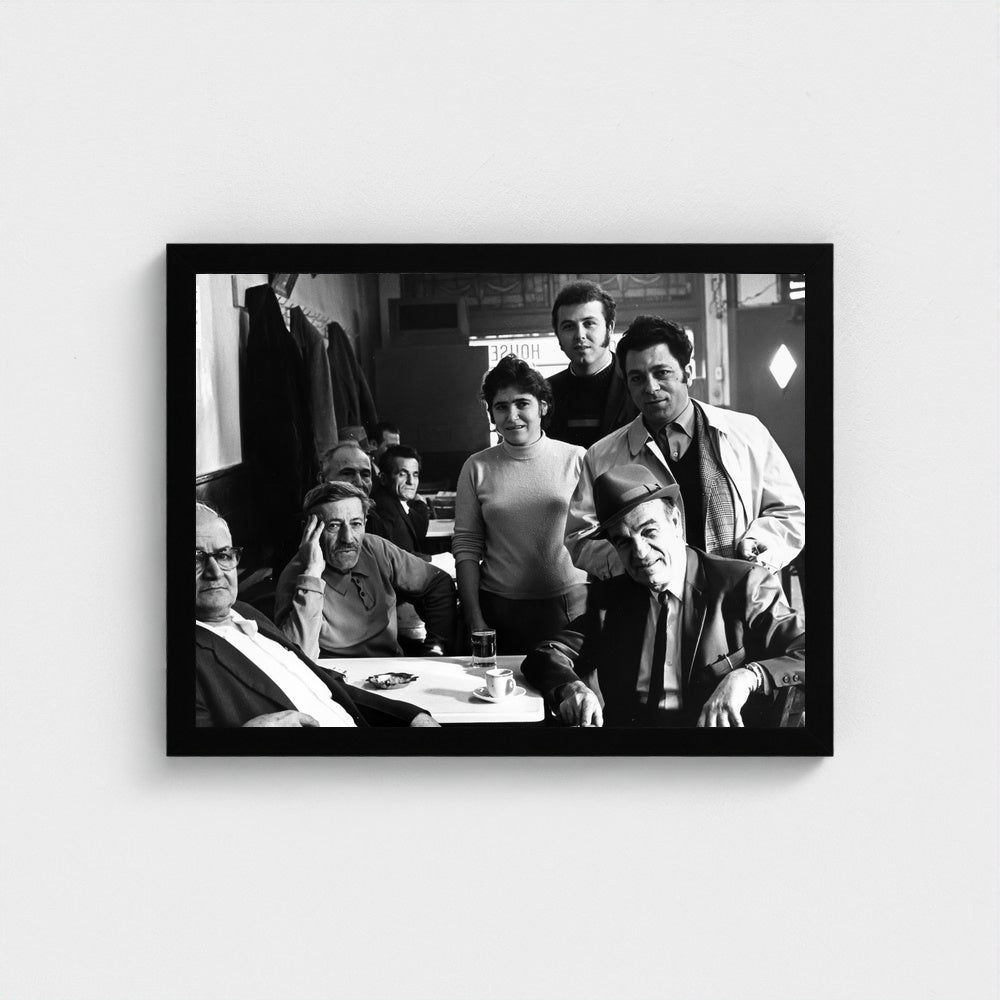 Gathering around the Coffeehouse Table — 12 × 16 inch black framed print