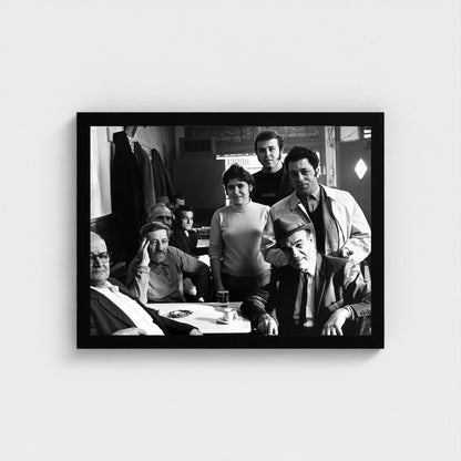 Gathering around the Coffeehouse Table — 12 × 16 inch black framed print