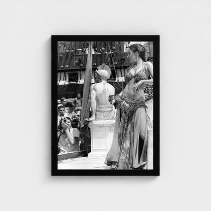 A Performer beside the Festival Stage — 12 × 16 inch black framed print