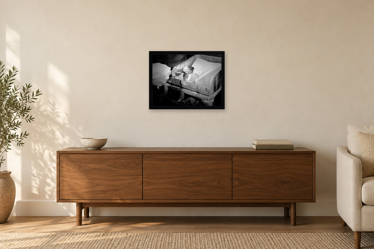Making Coffee over Hot Sand in a black frame, shown in a home setting — room visualization