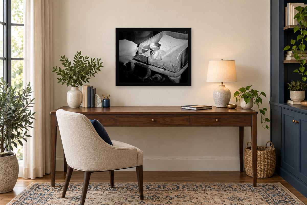 Making Coffee over Hot Sand in a black frame, shown in an office setting — room visualization
