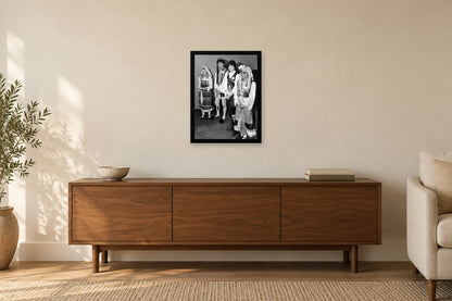 Young People in Traditional Dress in a black frame, shown in a home setting — room visualization