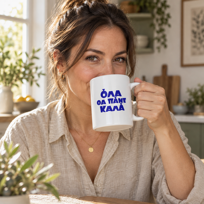 AI-generated lifestyle image: woman drinking coffee in a sunlit kitchen with the Όλα Θα Πάνε Καλά white 15 oz mug