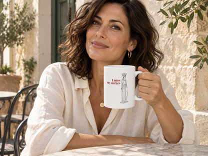 AI-generated lifestyle illustration of a person holding the Caryatid — I Miss My Sisters — 15 oz Ceramic Mug; item sold individually